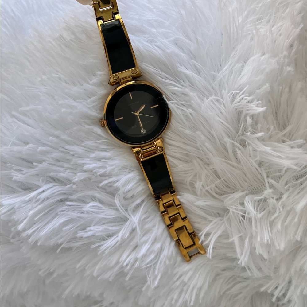 Women's AK/1414BKGB Diamond-Accented Bangle Watch
